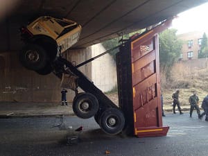 Tipper truck colliding with bridge Tipper truck bin colliding with bridge